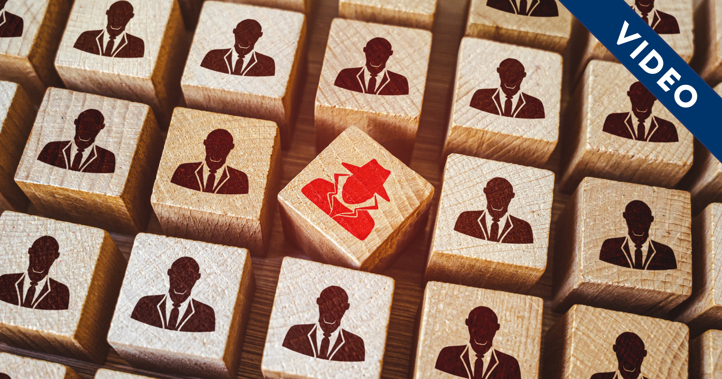 Wooden blocks with people icons and the text "video"
